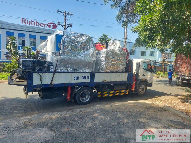 Các loại máy in công nghiệp cần cẩu hạ bằng xe chuyên dụng